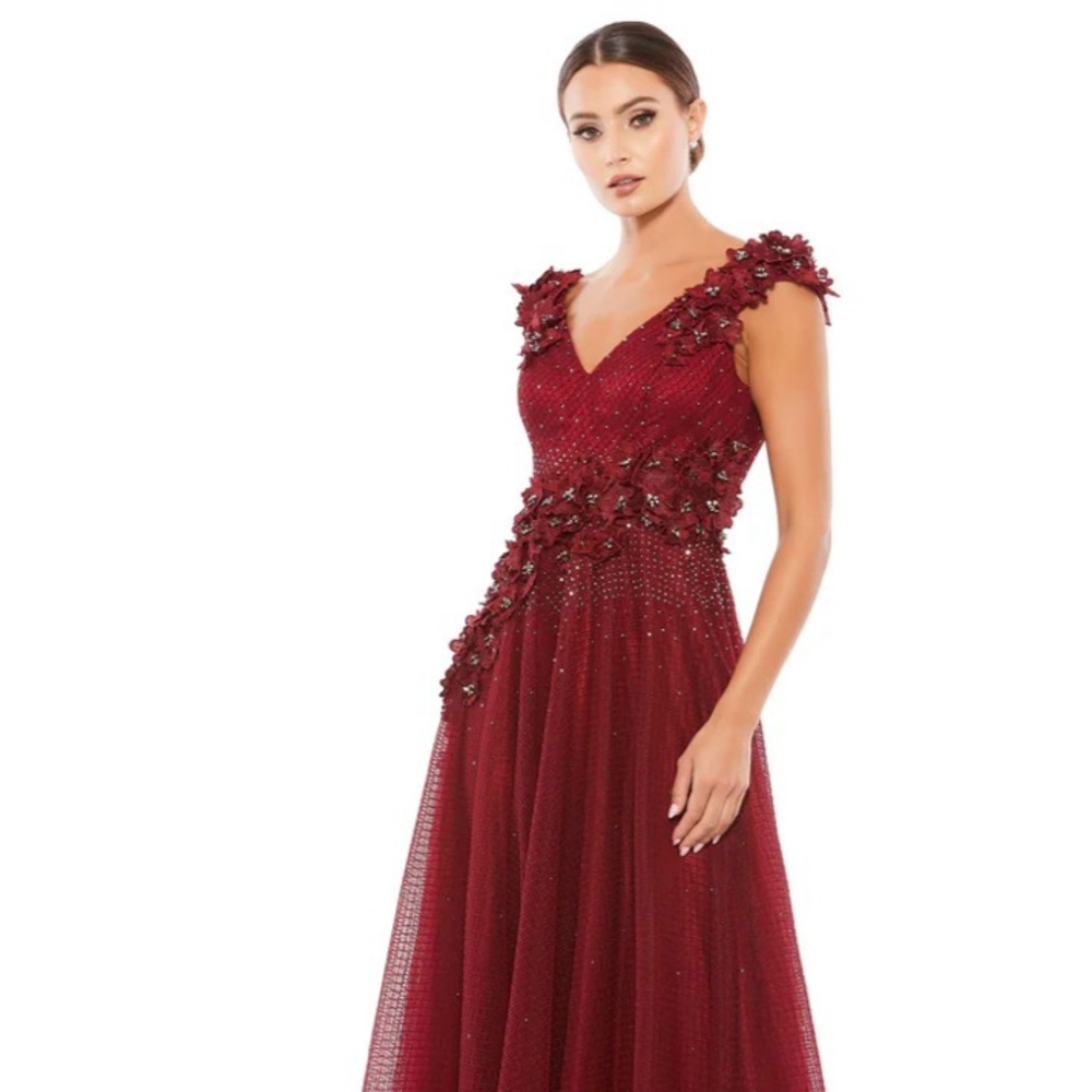 Burgundy floral appliqué Mac Duggar gown